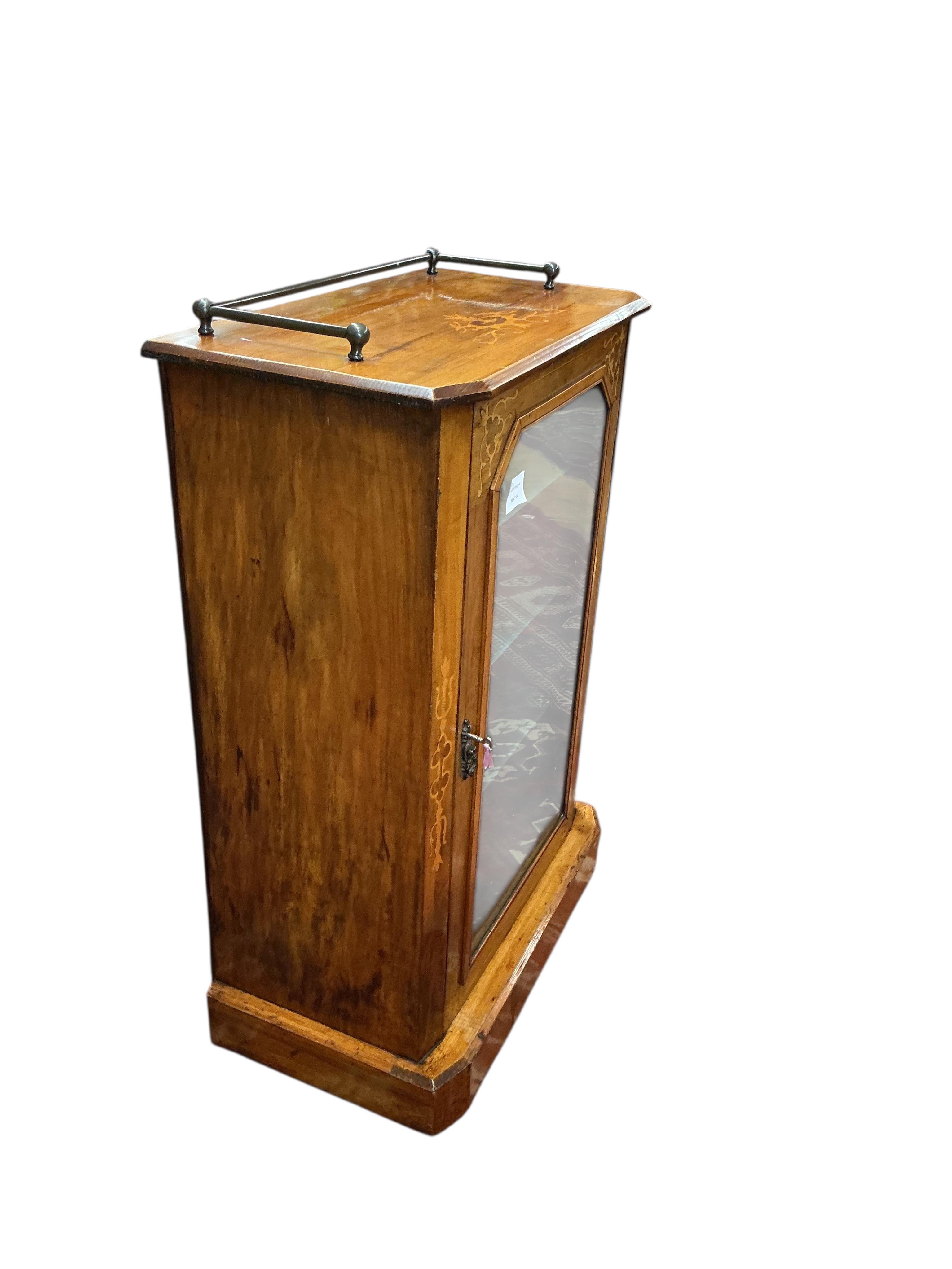A late Victorian inlaid walnut music cabinet, width 57cm, depth 31cm, height 88cm